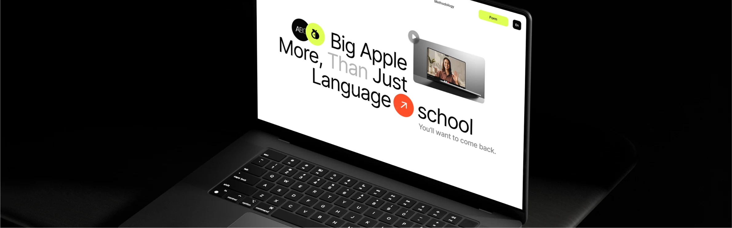 BigApple — the language-school site on a laptop