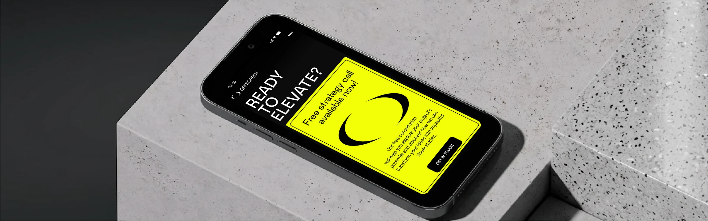 OffscreenPro — the site on a phone, on a concrete plinth